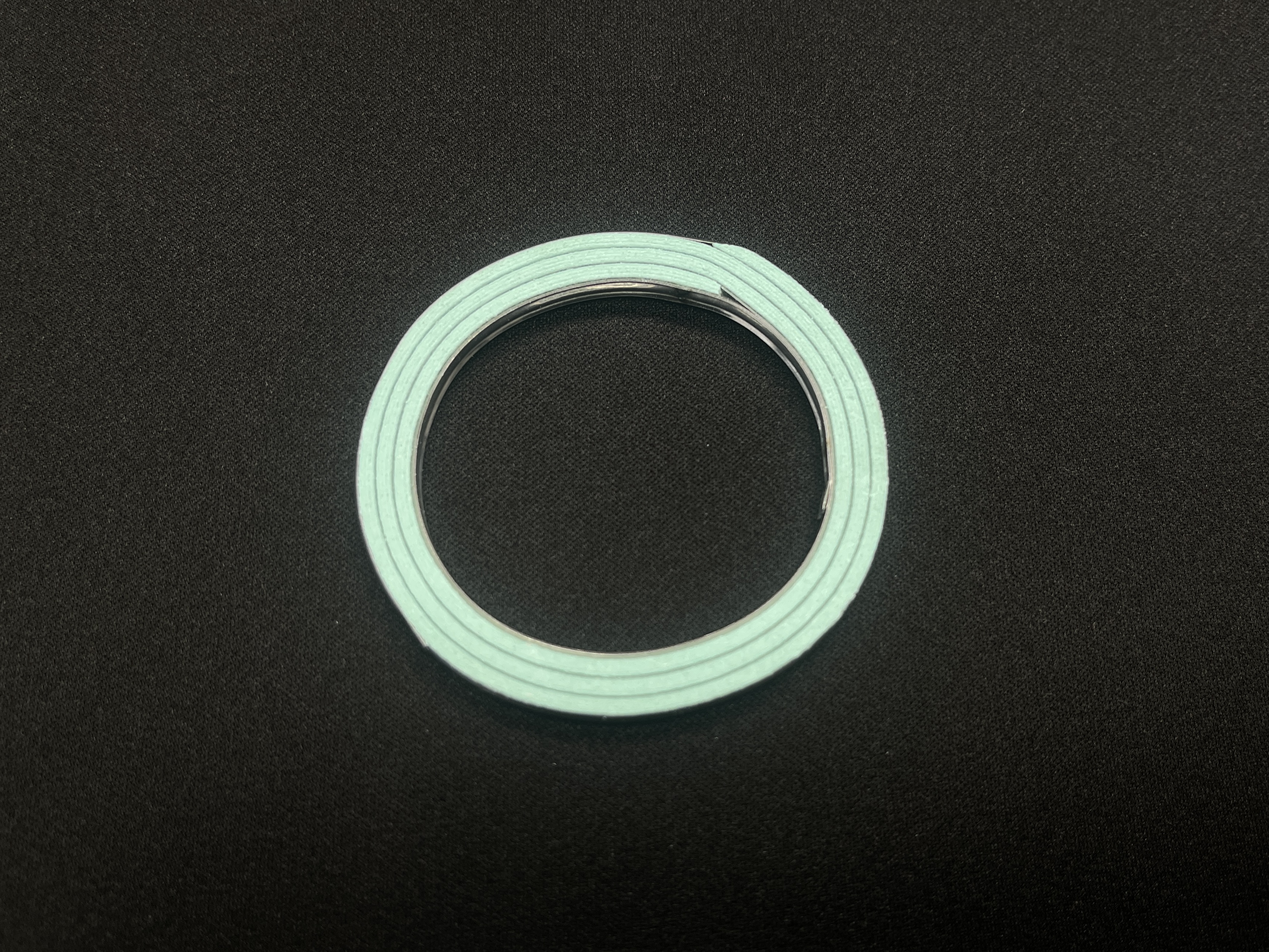 Кольцо выхлопной трубы 49x64x5